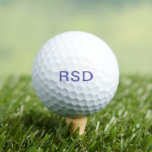 Lila Monogramm-Initialen Personalisiert Golfball<br><div class="desc">Eigene Golfbälle machen großartige Geschenke für jede Anlässe. Dieses Design enthält einen lila Blocktext im Monogramm-Stil. Sie können den Text mit beliebigen Initialen oder Formulierungen Ihrer Wahl anpassen. #golflover</div>