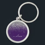 Lila Silver Glitzer Girly Glam Monogram Schlüsselanhänger<br><div class="desc">Silver und Lila Sparkle Glitzer Script Monogram Name Keychains (Key Chain). Das macht den perfekten 16 Geburtstag,  Hochzeit,  Brautparty,  Jubiläum,  Babydusche oder Junggeselinnen-Abschied Geschenk für jemanden,  der Lieben glamourösen Luxus und schicke Stile.</div>