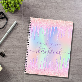 Lila Tropfen in Rosa Notizbuch