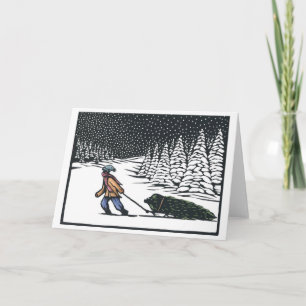 Linocut: Junge, der Weihnachtsbaum aus dem Wald zi Feiertagskarte