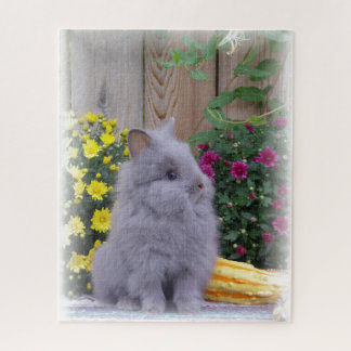 Lionhead Häschen mit Blumen auf a Puzzle