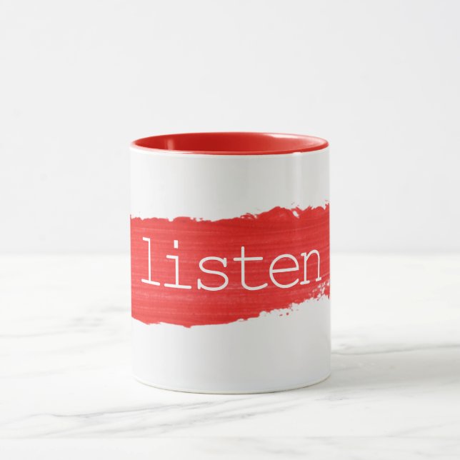 LISTEN-Text auf der roten Tasse (Zentrum)