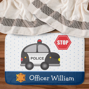 Little Boy Police Officer and Car Badematte