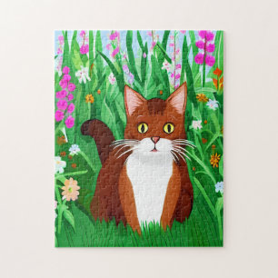 Little Ginger Brown Kitty in einem Feld der Blume Puzzle