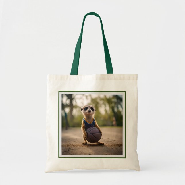 Little Hoop Star: Baby Meerkat Holding Basketball Tragetasche (Vorne)