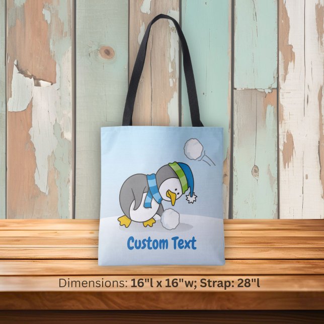 Little penguin getting a snow ball tote bag (Von Creator hochgeladen)