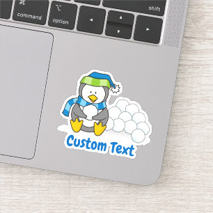 Little penguin sitting with snowballs aufkleber