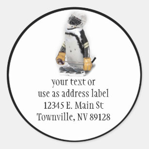 Little Penguin Wearing Hockey Gear Runder Aufkleber