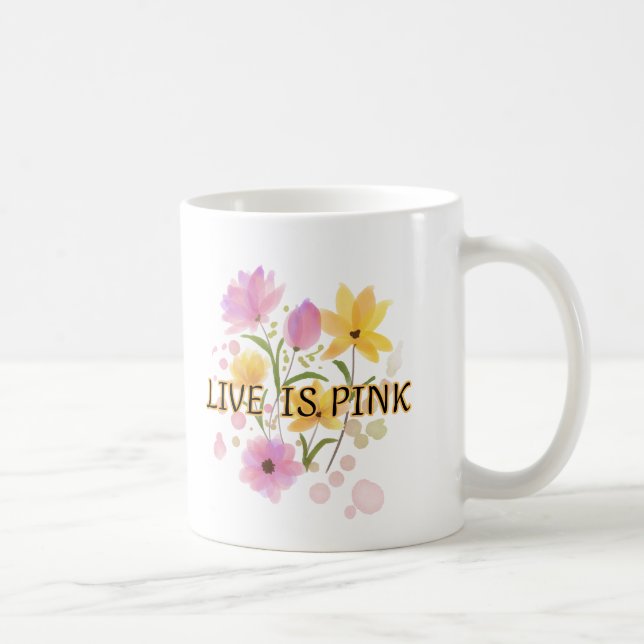 "LIVE IS PINK" is written in a dark Kaffeetasse (Rechts)