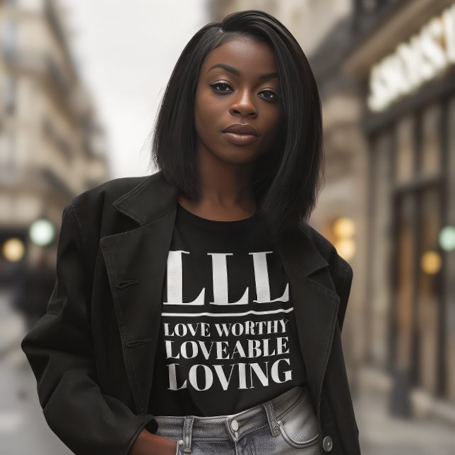 LLL - Liebe wert, liebenswert, liebenswert T-Shirt (Young African American woman wears a black shirt that reads "LLL: Love Worthy, Loveable, Loving.")