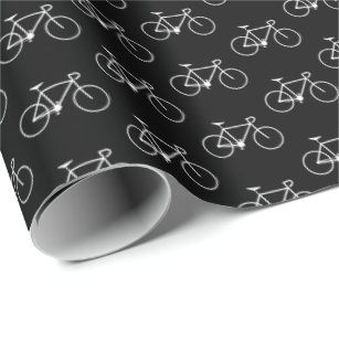 Lose weiße Fahrrad-Formen auf einem schwarzen Geschenkpapier