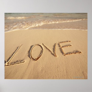 'Love' sand written on the beach with incoming Poster