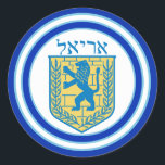 Löwe von Judah Emblem Ariel Hebrew Sticker<br><div class="desc">Runder Aufkleber mit einem Bild eines blauen und gelben Löwen von Juda Emblems mit Ariel oben in hebräisch,  und breite doppelblaue,  hellblaue,  auf weiß getrimmte Grenzen. Siehe dazu passendes Konfetti,  Etikett und Packpapier. Die gesamte Hanukkah Sticker Kollektion finden Sie unter CARDS & STICKERS Kategorie im HOLIDAYS Bereich.</div>