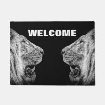 Löwenportraits auf Schwarz Willkommen