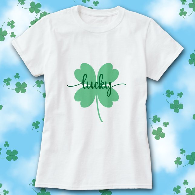 Lucky Clover Schrift St. Patrick’s Day T-Shirt     (White t-shirt with green Lucky script on a large solid green four-leaf clover graphic.)