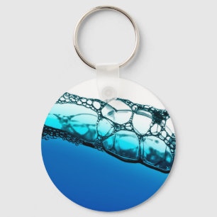 Luftblasen im blauen Wasser Schlüsselanhänger