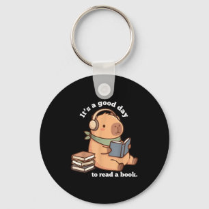Lustige Capybara beim Lesen eines Buches süßes Les Schlüsselanhänger