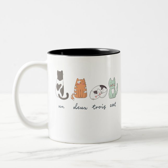 Lustige niedliche französische Katze Zweifarbige Tasse (Links)