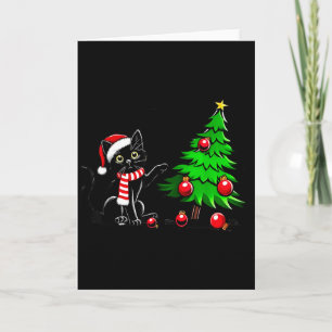 Lustige schwarze Katze stößt Weihnachtsbaum um Kat Karte