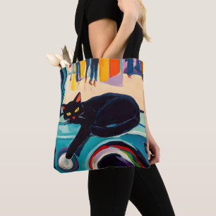 Lustige schwarze Katze und Waschmaschine