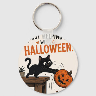 Lustige schwarze Katze wirft Halloween-Kürbis um Schlüsselanhänger