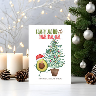 Lustiger Avocado-Weihnachtsmann, der um den Weihna Feiertagskarte