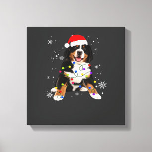 Lustiger Berner Sennenhund zündet Weihnachts-Match Leinwanddruck