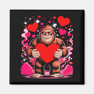 Lustiger Bigfoot mit Sonnenbrille hält Herz Valent Magnet