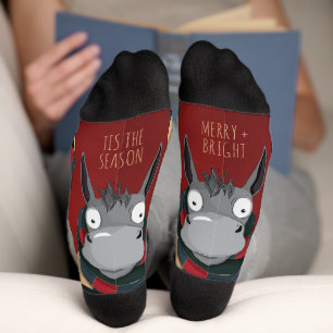 Lustiger Esel-Cartoon mit festlichen Streifen auf Socken