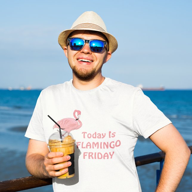 Lustiger Flamingo Freitag Thema T-Shirt (male model at oceanfront wearing today is flamingo friday tee shirt)