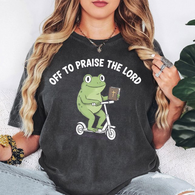 Lustiger Frosch fährt mit dem Roller mit Bibel T-Shirt (Von Creator hochgeladen)