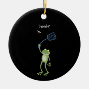 Lustiger grüner Frosch, der eine Fliege mit einer  Keramik Ornament