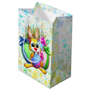 Lustiger Hase, der ein Osterei beißt Mittlere Geschenktüte