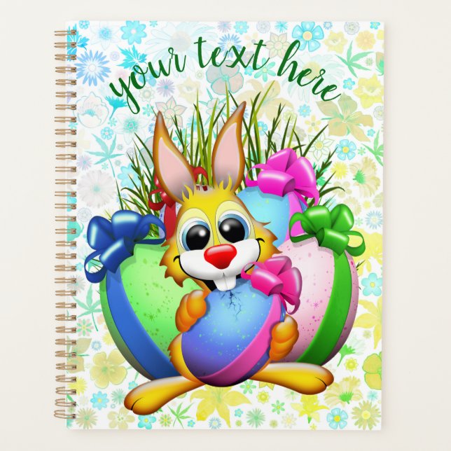 Lustiger Hase, der ein Osterei beißt Planer (Vorderseite)