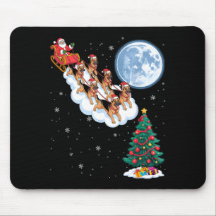 Lustiger Santa reitet auf deutschem Schäferhund Ba Mousepad