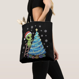 Lustiger süßer Alien Weihnachtsmann schmückt Weltr