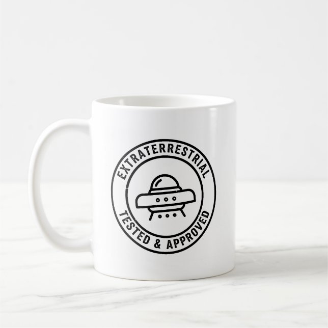 Lustiger UFO-Alien-Außerirdischer Getestet & Zugel Kaffeetasse (Links)