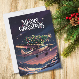 Lustiger Weihnachtsbaum auf Cessna-Flugzeug Foto Feiertagskarte