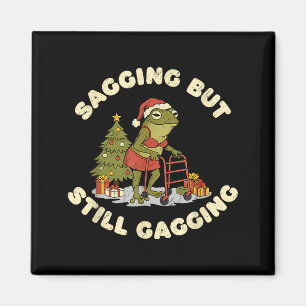 Lustiger Weihnachtsfrosch hängt, aber würgt immer Magnet