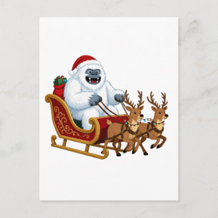 Lustiger Yeti fährt auf einem Weihnachtsschlitten Postkarte