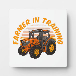Lustiger zukünftiger Bauer in Ausbildung Traktor L Fotoplatte