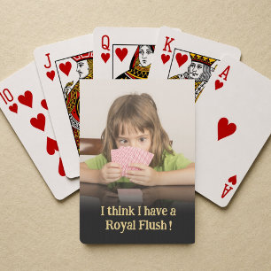 Lustiges Kind überrascht von Royal Flush Foto-Gesc Spielkarten