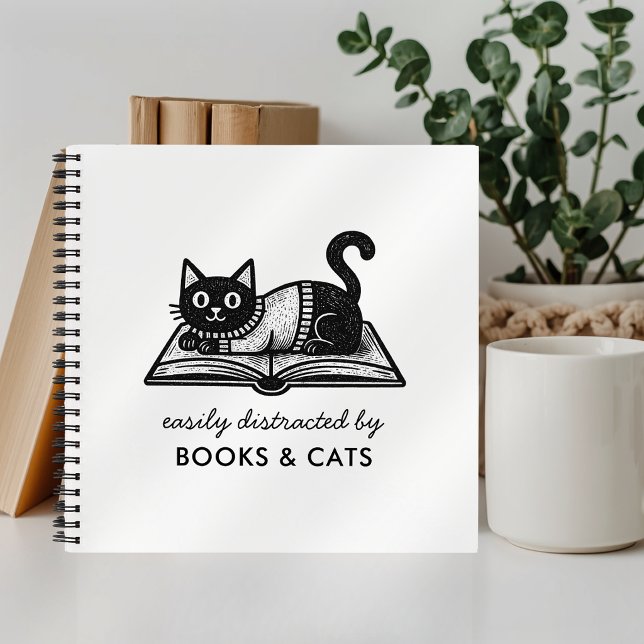 Lustiges leicht ablenkbar durch Bücher und Katzen  (Von Creator hochgeladen)
