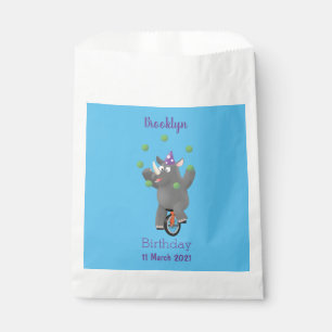 Lustiges süßes Nashorn beim Jonglieren auf einem E Geschenktütchen