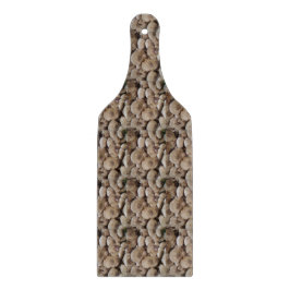 lustiges, vegulierbares Bild von frischen Knopfpil Schneidebrett