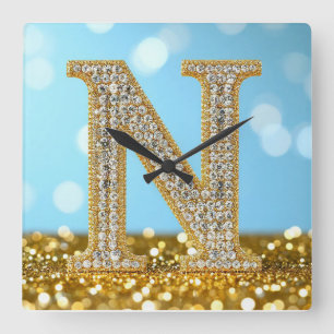 Luxus-Diamant-Buchstabe N auf goldenem Glitter-Hin Quadratische Wanduhr