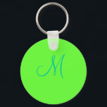 M SCHLÜSSELANHÄNGER<br><div class="desc">Aqua Buchstabe M mit grünem Hintergrund</div>