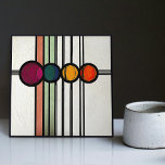 Mackintosh Art Deco Abstrakte Wand-Deco Fliese<br><div class="desc">Diese Keramik-Kachel weist fett geometrische Formen auf, und die Blumenmuster erinnern an den ikonischen Mackintosh-Stil. Er war ein prominenter schottischer Architekt, Designer und Künstler der Jugendstil-Bewegung. Saubere Linien, geometrische Formen und ein starkes Gefühl der Symmetrie prägen seine Arbeit. Diese Elemente sind in unserer Sammlung von Keramiken-Fliesen wunderschön vertreten. Mackintoshs Designs...</div>