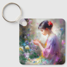 Mädchen bewundert eine Blume in ihren Händen