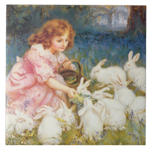 Mädchen, das die Kaninchen Füttre (von Frederick M Fliese